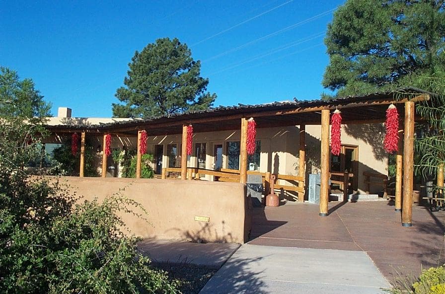 Petroglyph's Information Center with bright red chile ristras hanging off the portal.