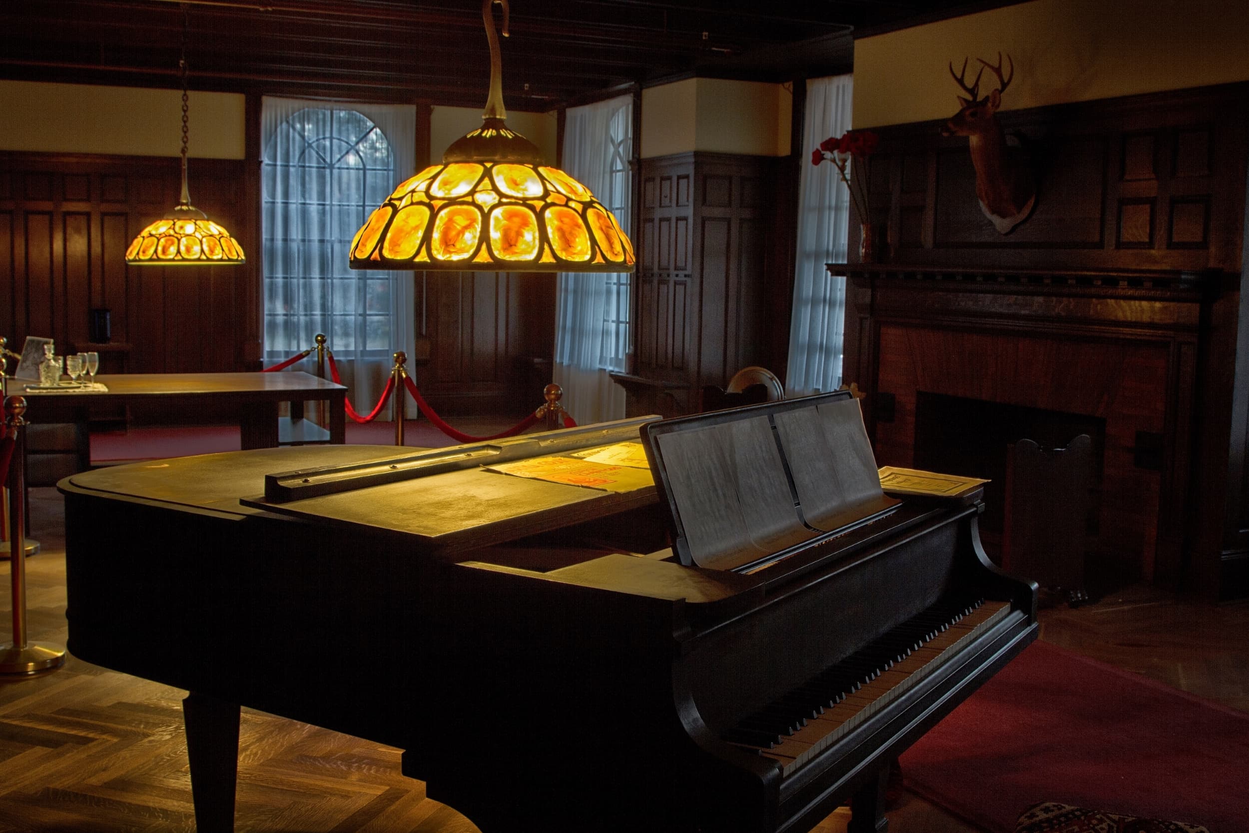 Grand piano with chandelier above
