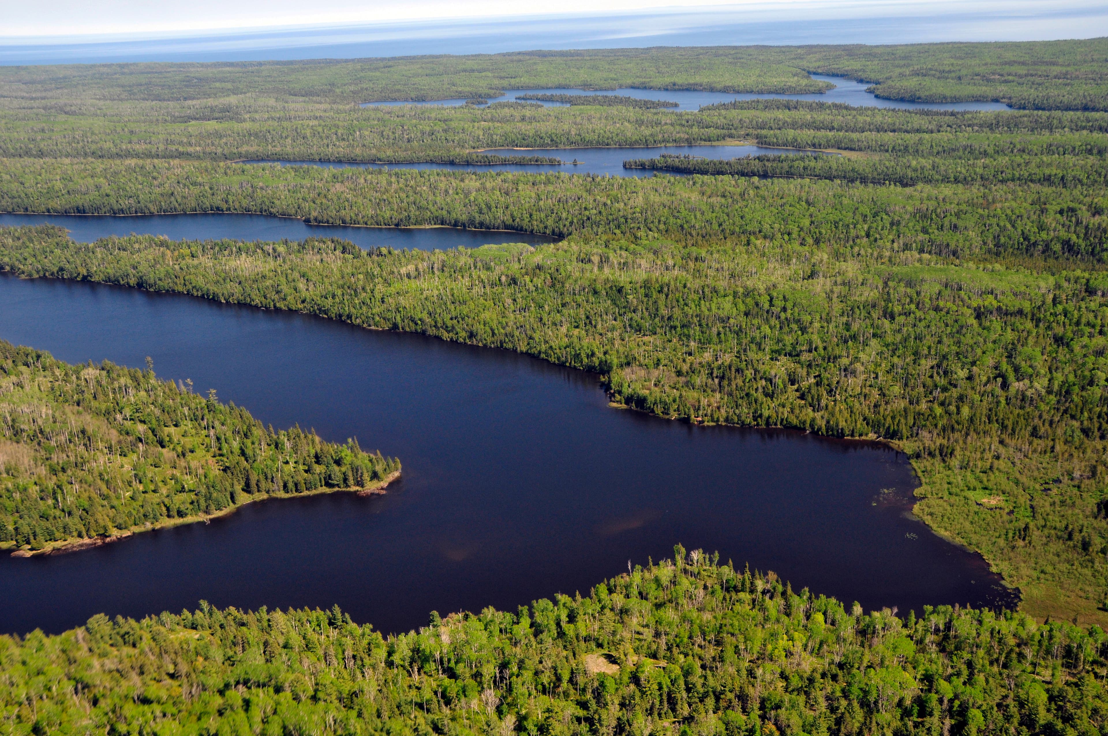 Aerial view of the blue water of Chickenbone Lake.