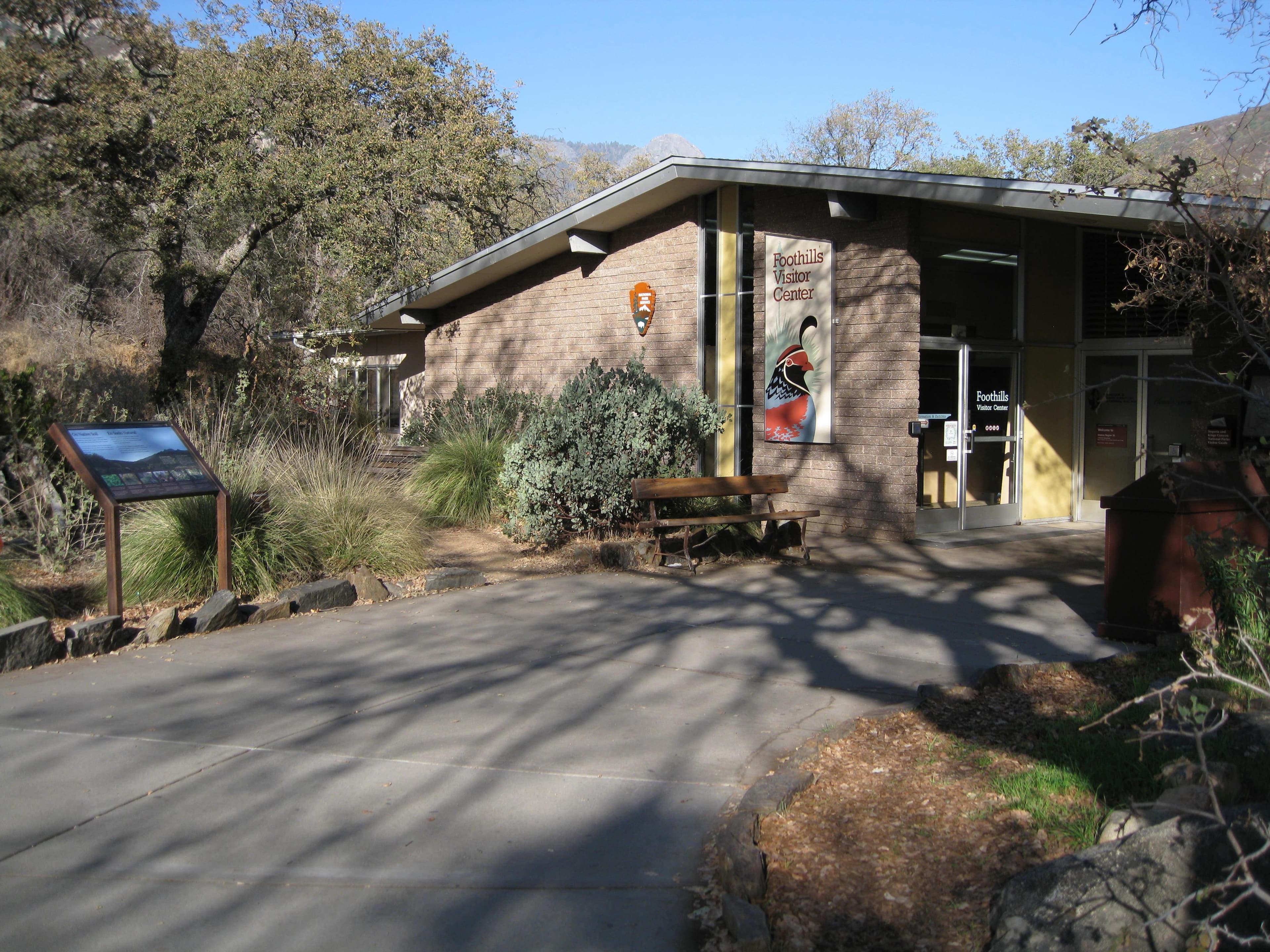 View of the Foothills Visitor Center and sidewalk approaching front door.