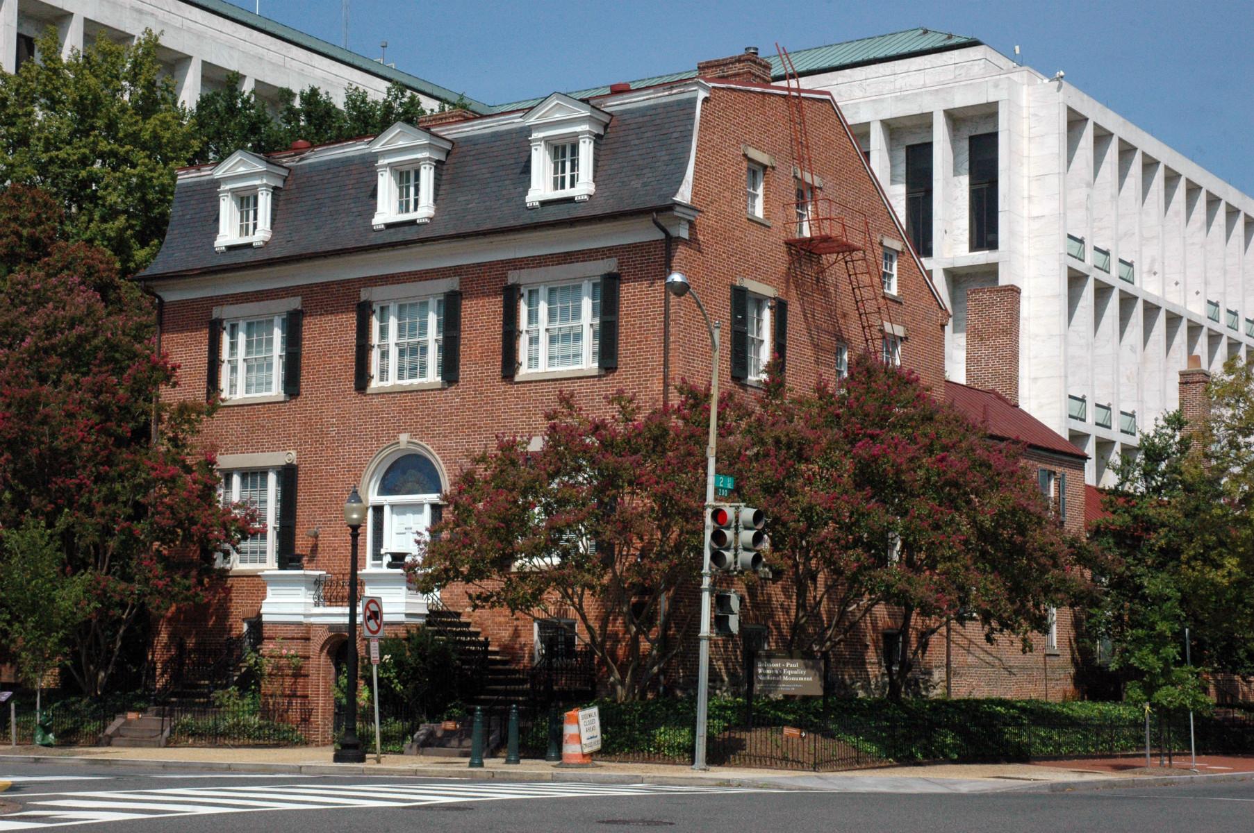 A three-story brick house on a Washington, D.C. street corner