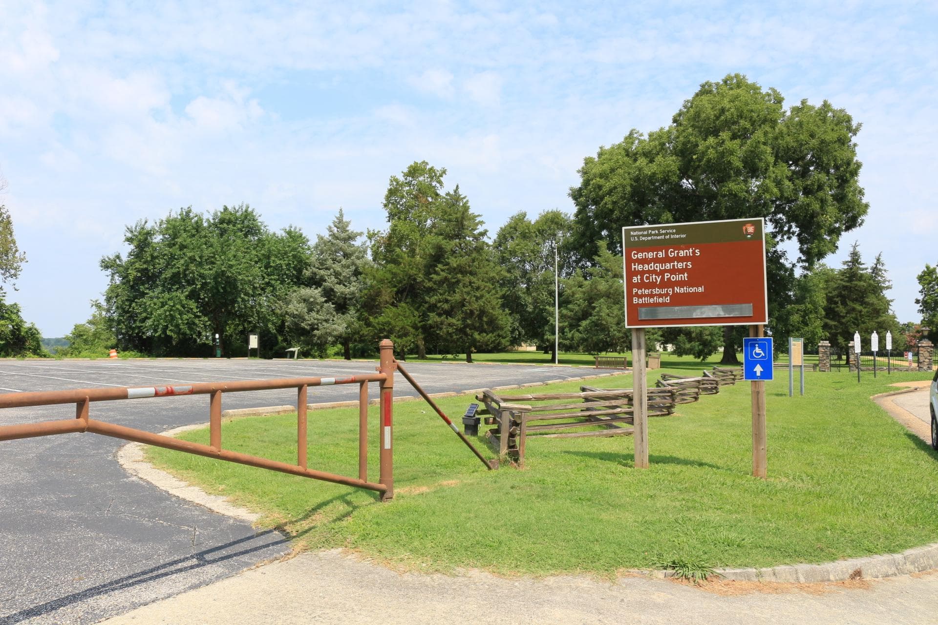 paved parking lot behind gate, with sign "General Grant's Headquarters at City Point"