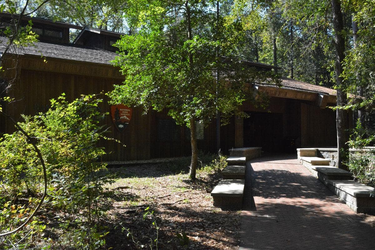 Exterior view of the Harry Hampton Visitor Center from the brick walkway