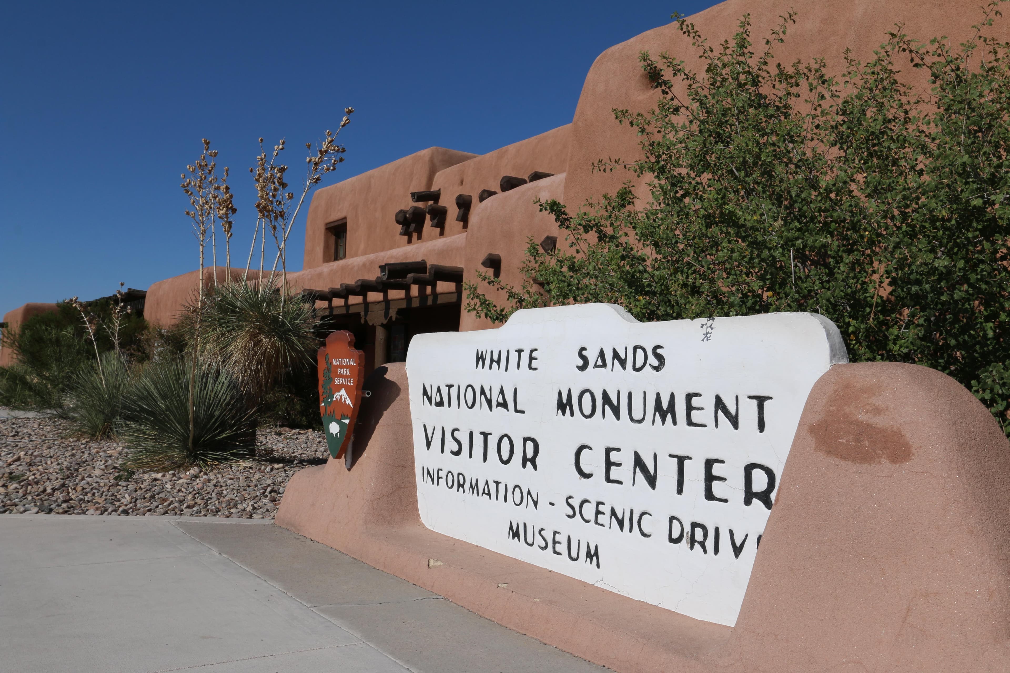 The White Sands National Monument Visitor Center sign in front of the Visitor Center.