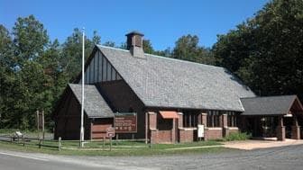 A large building with slate roof.