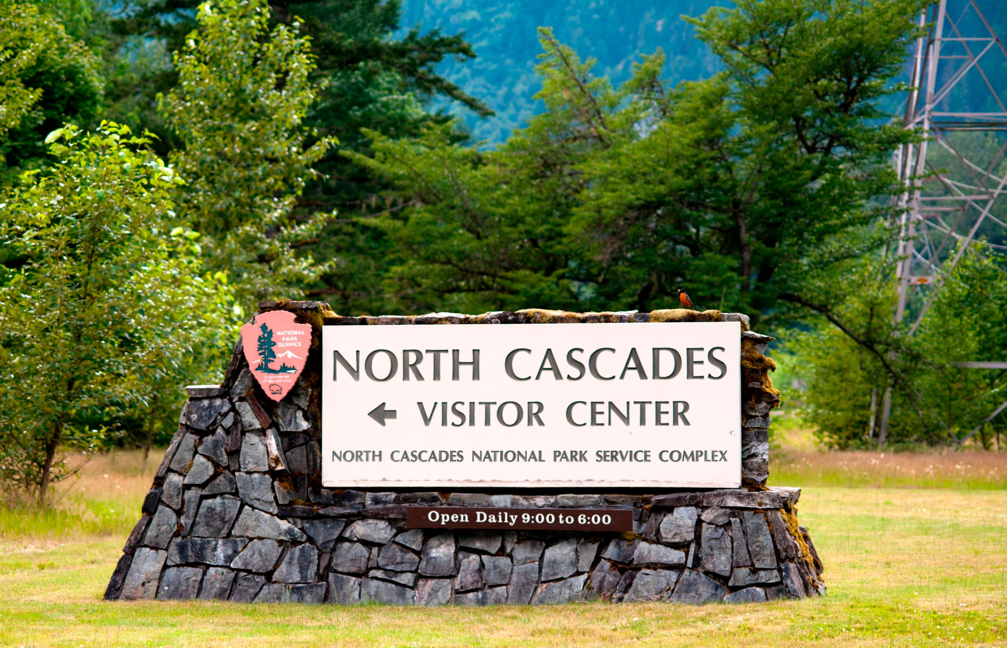 A stone and wood sign for the North Cascades Visitor Center