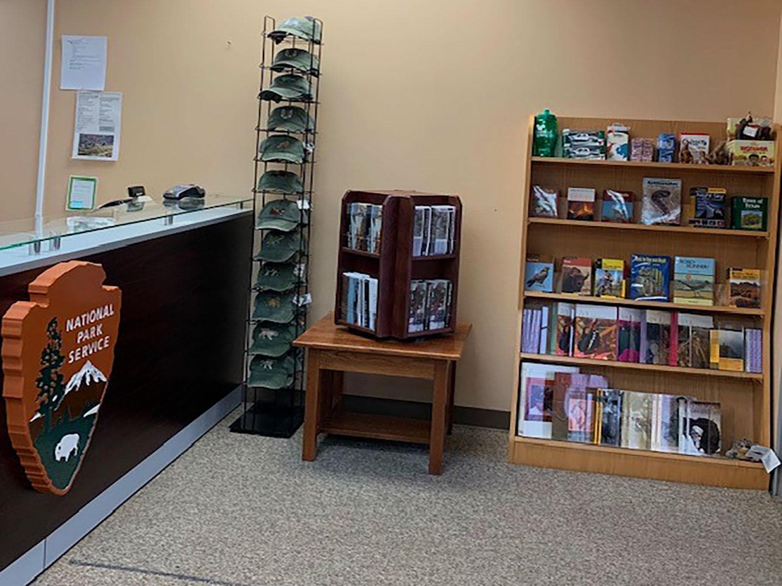 Front desk at Park Headquarters. There are books/gifts for sale and information for visitors.