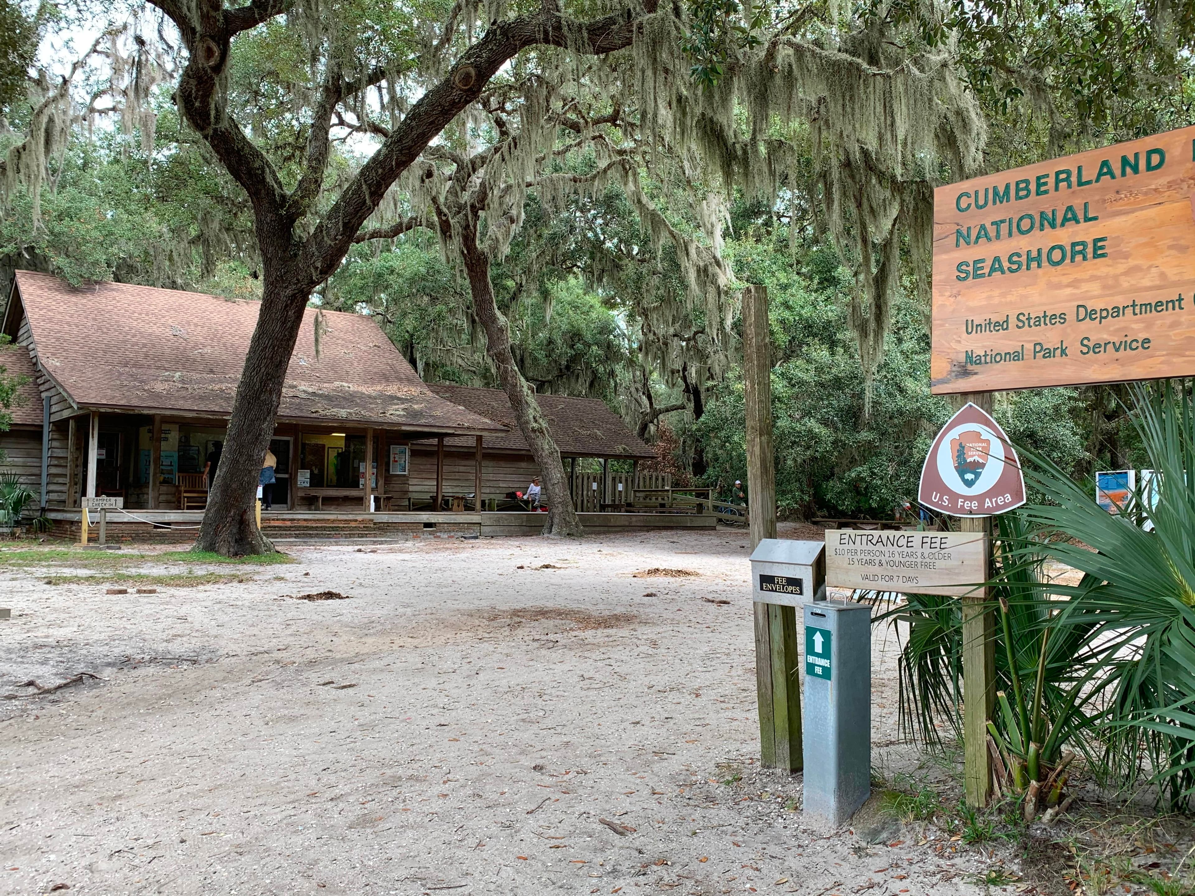 Ranger station tucked into the trees with Cumberland Island NS entrance sign